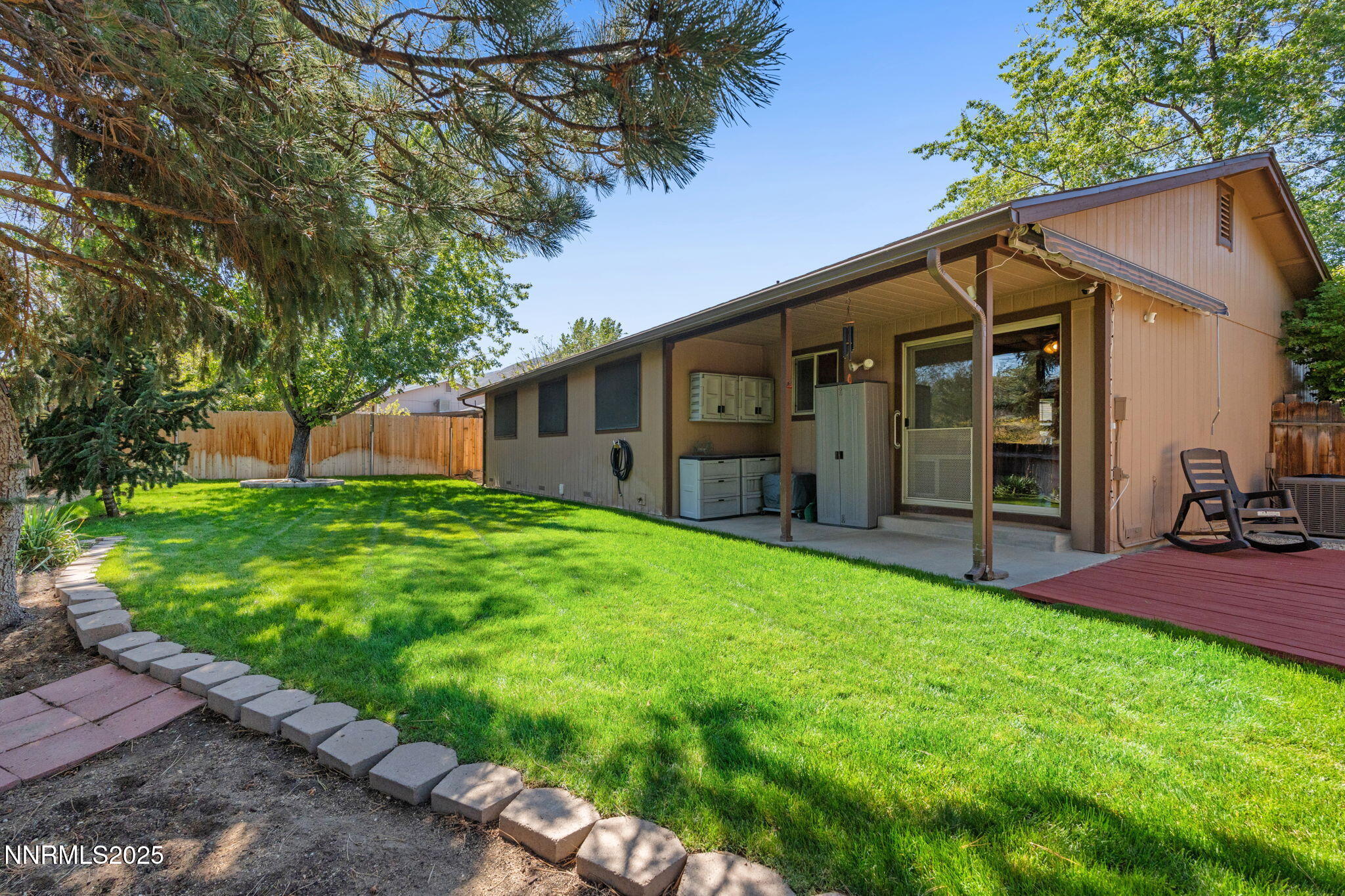 8678 Strutter Way Reno, NV 89506 - Photo 33 of 38 a view of a house with backyard