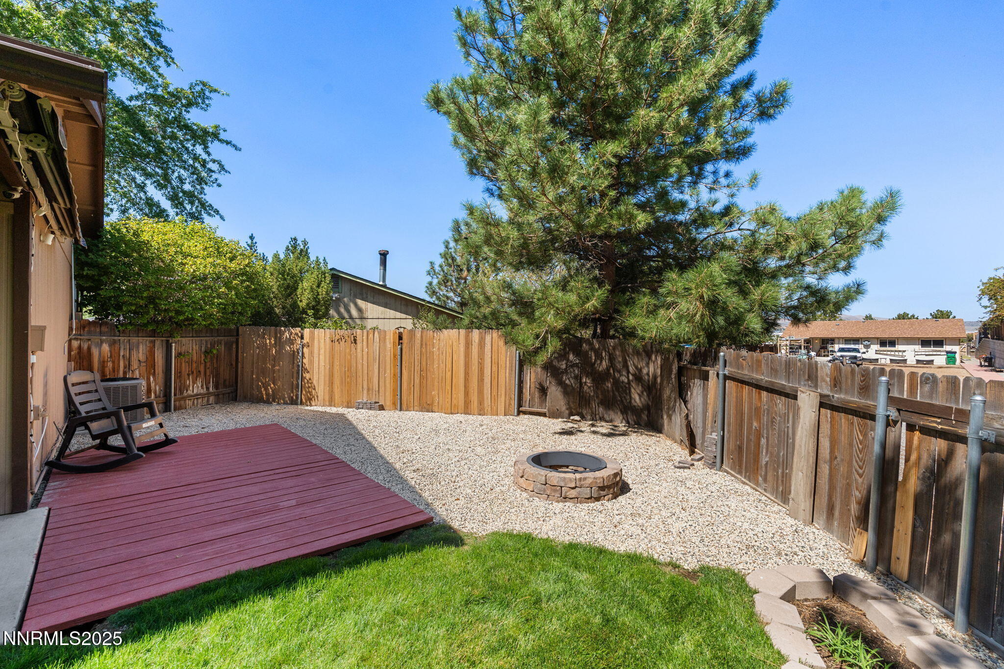8678 Strutter Way Reno, NV 89506 - Photo 34 of 38 a view of a backyard with sitting area