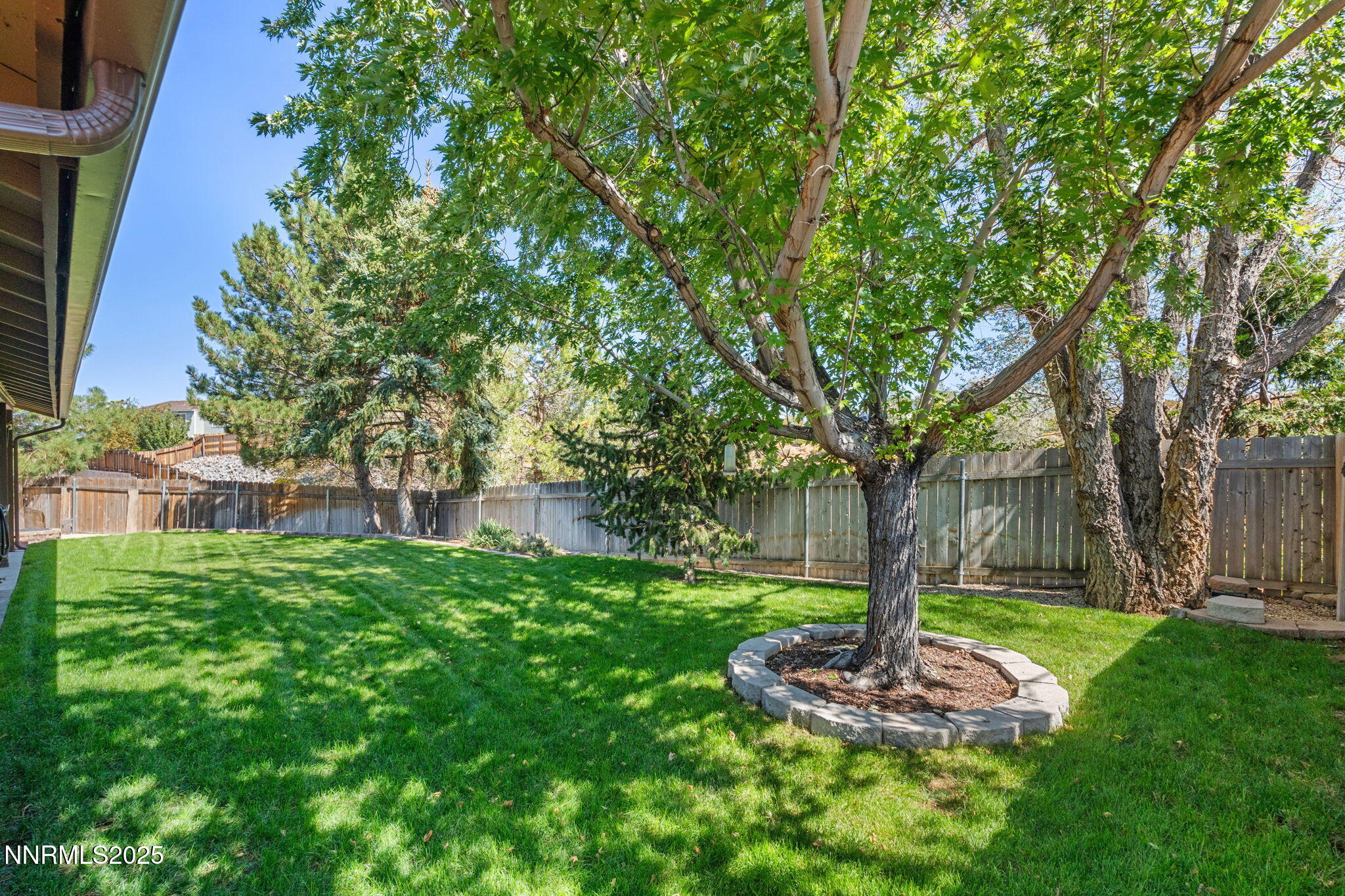 8678 Strutter Way Reno, NV 89506 - Photo 37 of 38 a front view of a house with a yard