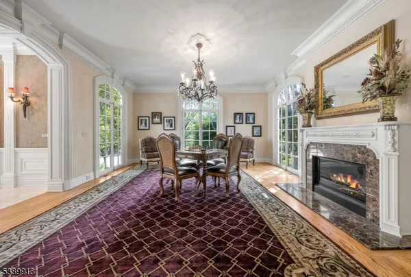 a living room with furniture a window and a fireplace