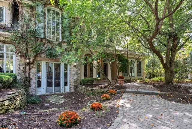 a backyard of a house with barbeque oven