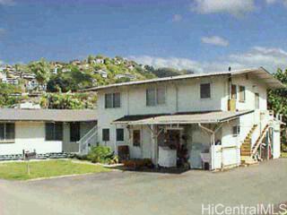 2401 Pauoa Road Honolulu, HI 96813 - Photo 1 of 1 a front view of a house with a yard