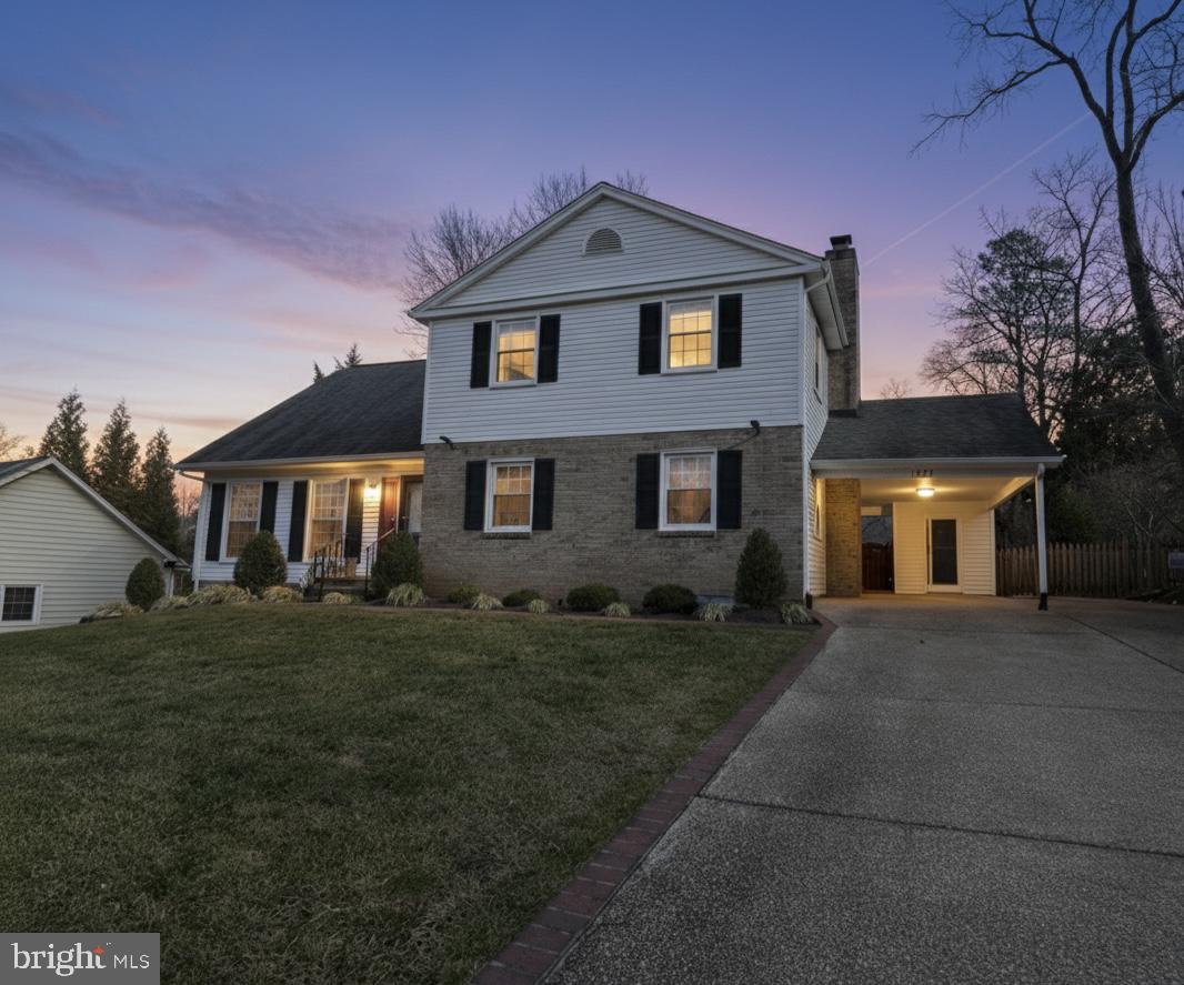 1743 Lockerbie Lane Vienna, VA 22182 - Photo 1 of 1 a front view of a house with a yard