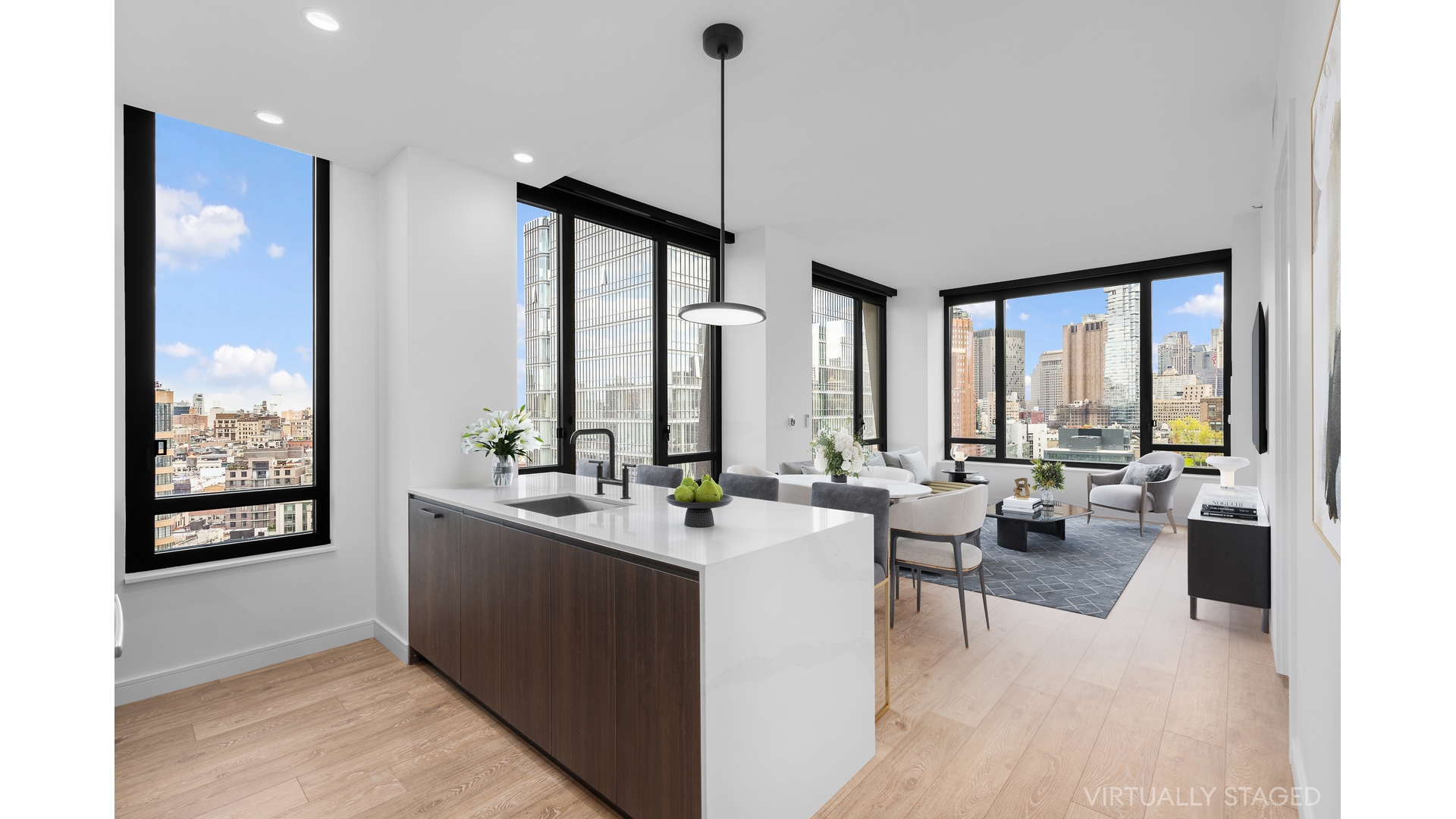 a living room with furniture and large windows