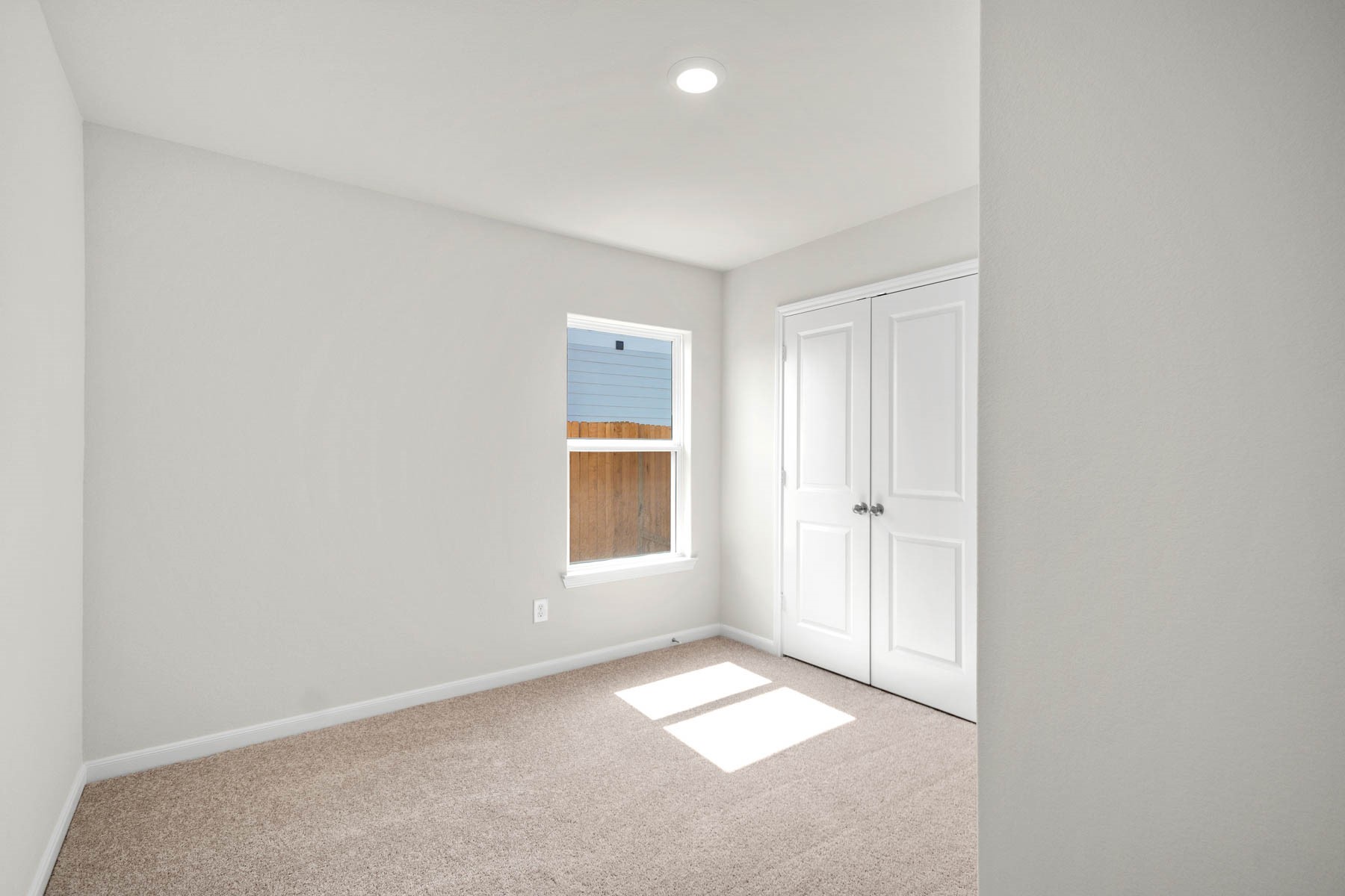 15866 Berry Hl Drive Conroe, TX 77303 - Photo 5 of 20 a view of an empty room with a window
