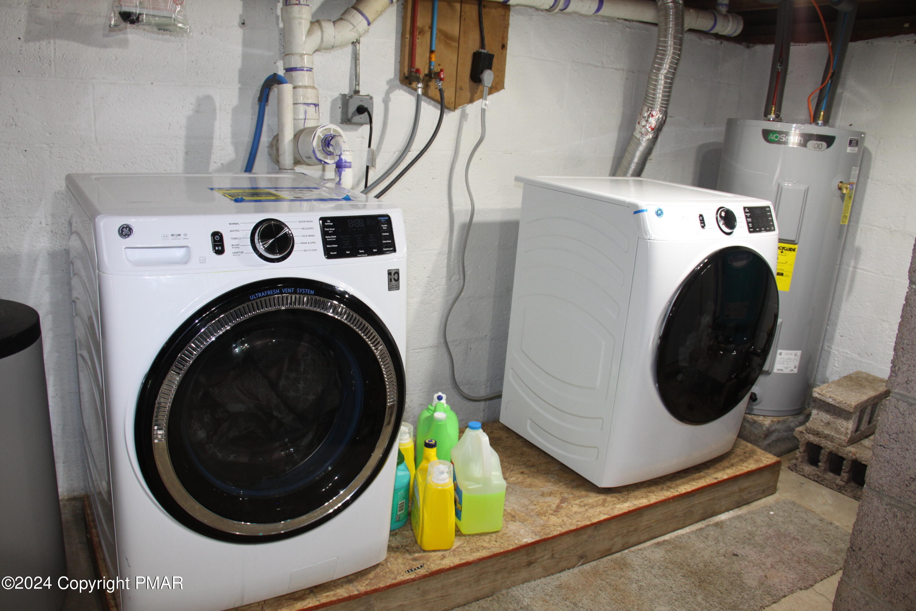 894 Spring Hill Road Sterling, PA 18463 - Photo 26 of 34 a utility room with dryer and washer