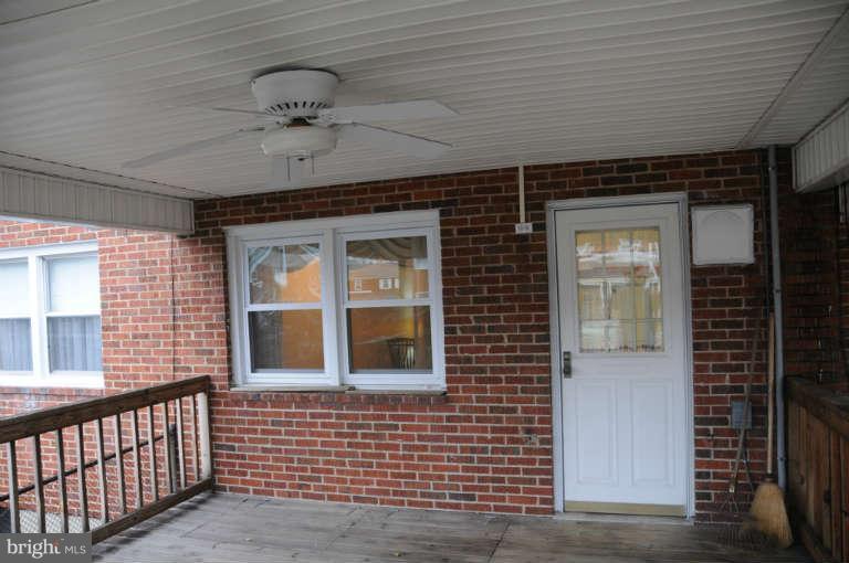 8173 Mid Haven Road Baltimore, MD 21222 - Photo 18 of 30 a view of a porch