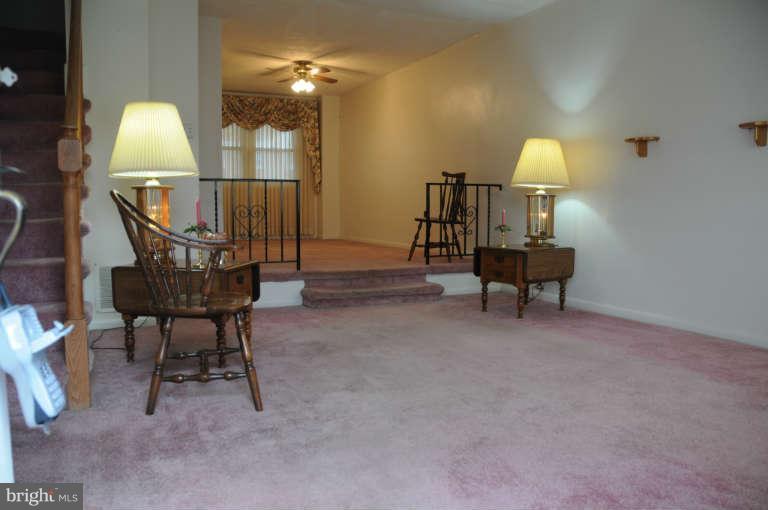 8173 Mid Haven Road Baltimore, MD 21222 - Photo 7 of 30 a view of a livingroom with furniture and a couch