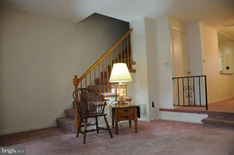8173 Mid Haven Road Baltimore, MD 21222 - Photo 8 of 30 a view of entryway with wooden floor