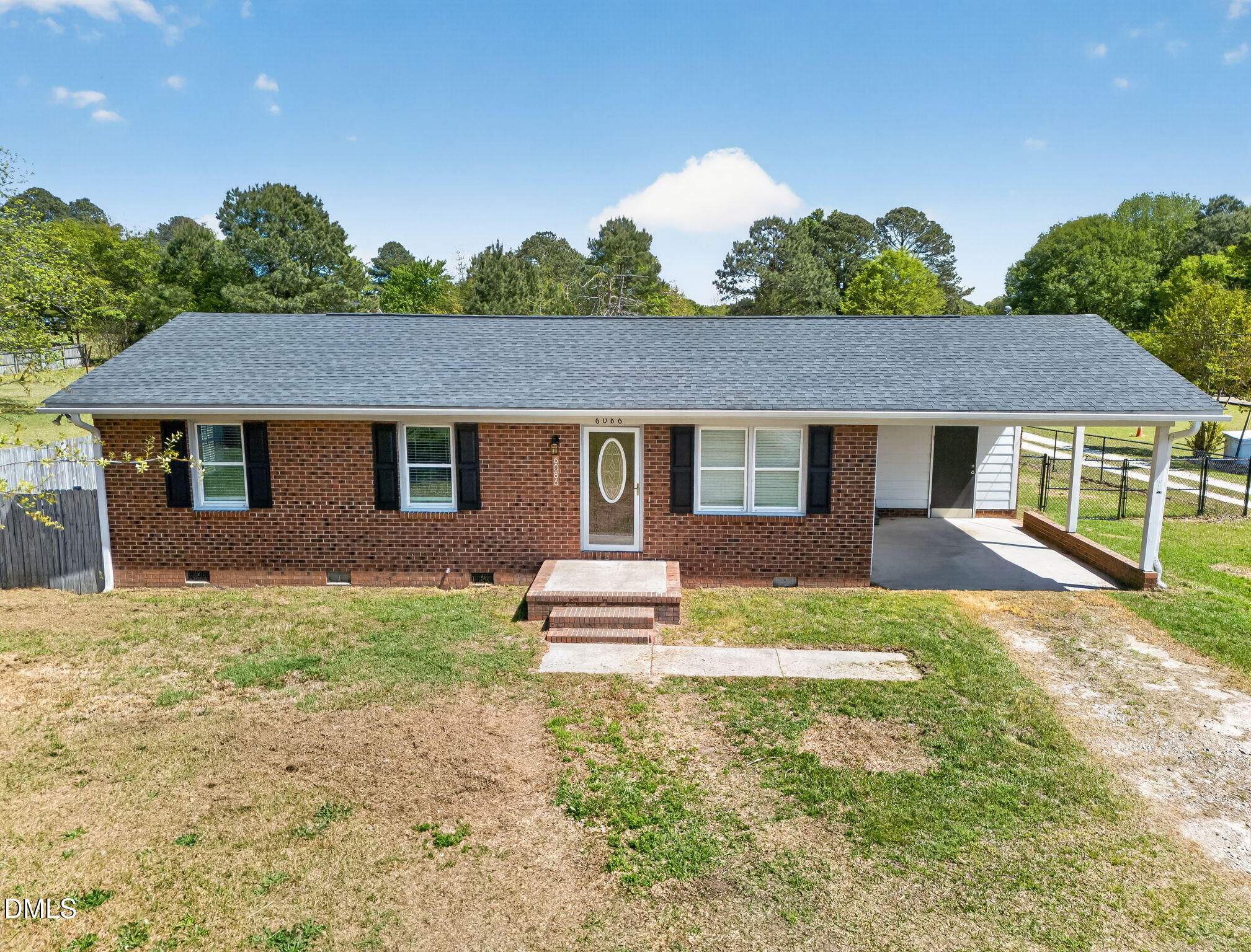 6086 Red Hill Church Road Coats, NC 27521 - Photo 36 of 44 a front view of a house with a yard