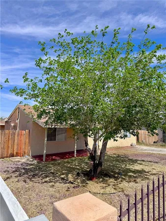a view of a backyard with a house