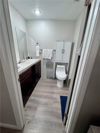 a bathroom with a sink and mirror