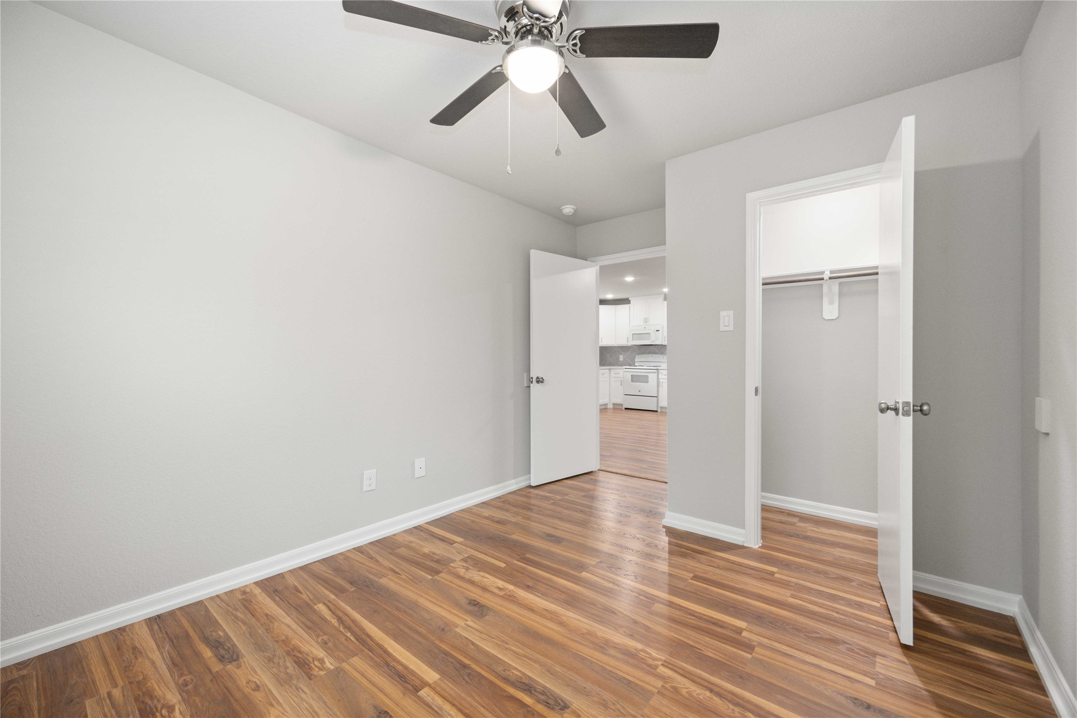 2816 Woodard Street, Unit A Houston, TX 77026 - Photo 13 of 14 a view of empty room with wooden floor
