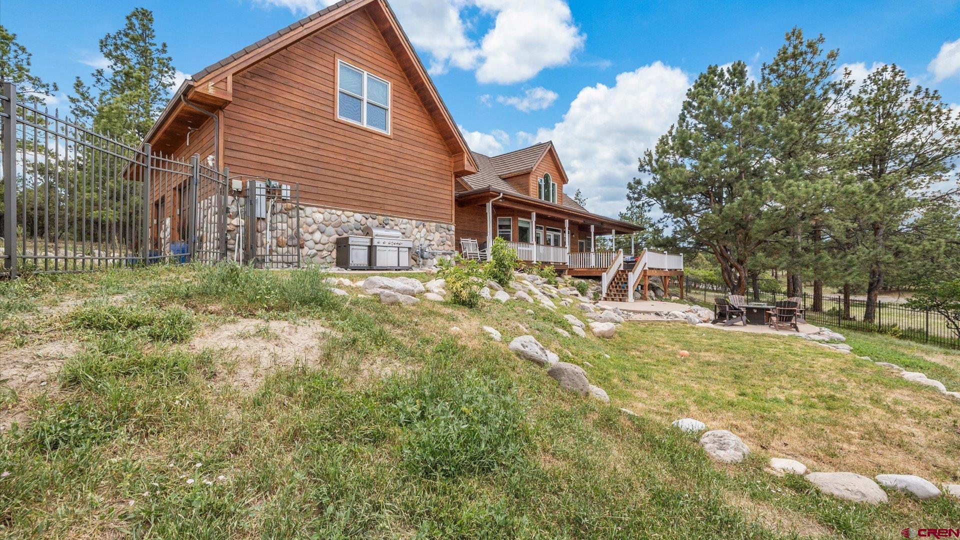 269 Puma Lane Ridgway, CO 81432 - Photo 36 of 36 a view of a house with a yard