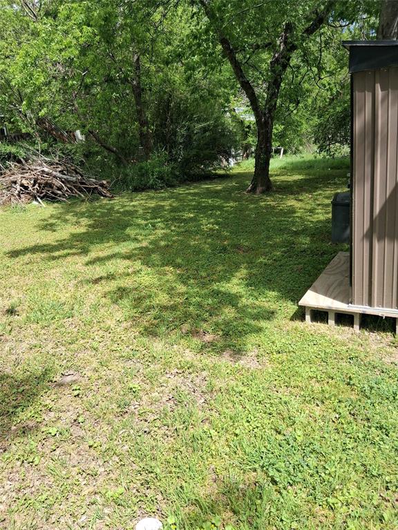 701 West Colorado Street Groesbeck, TX 76642 - Photo 11 of 12 View of grassy yard