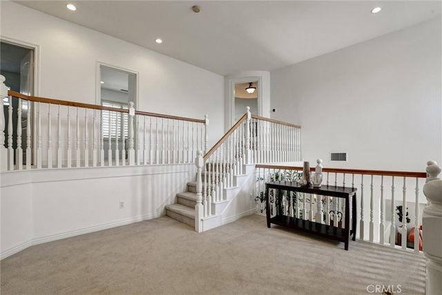 a view of hallway with staircase