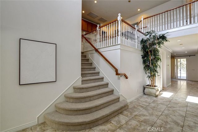 a view of entryway with a front door