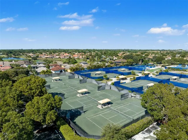 a view of balcony with yard