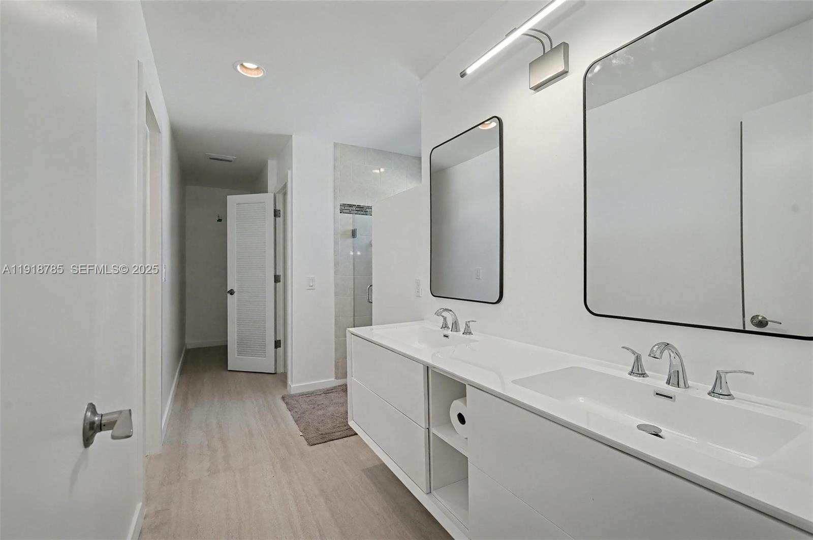 6438 Via Rosa Boca Raton, FL 33433 - Photo 28 of 45 a bathroom with a double vanity sink mirror and double
