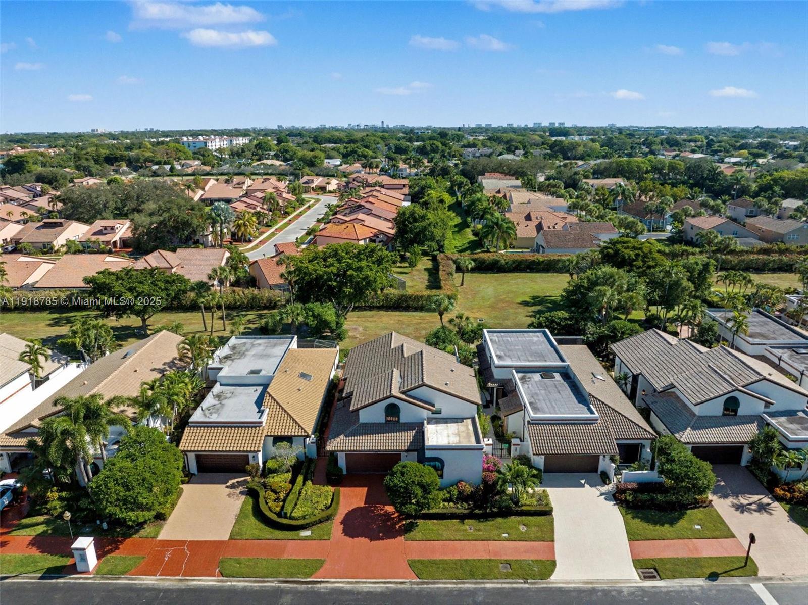 6438 Via Rosa Boca Raton, FL 33433 - Photo 3 of 45 an aerial view of house with yard swimming pool and outdoor seating
