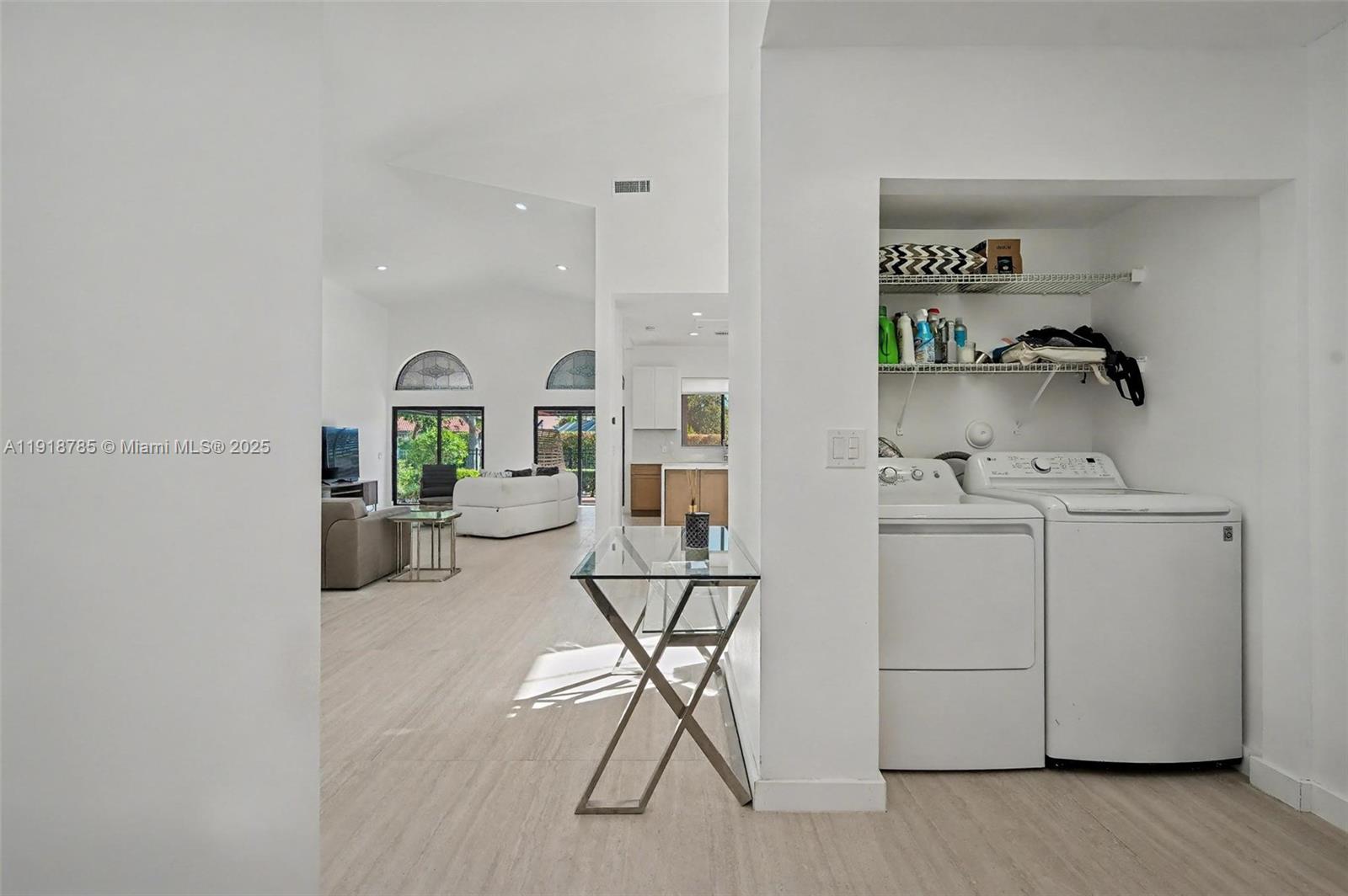6438 Via Rosa Boca Raton, FL 33433 - Photo 40 of 45 a view of a livingroom with furniture and a window