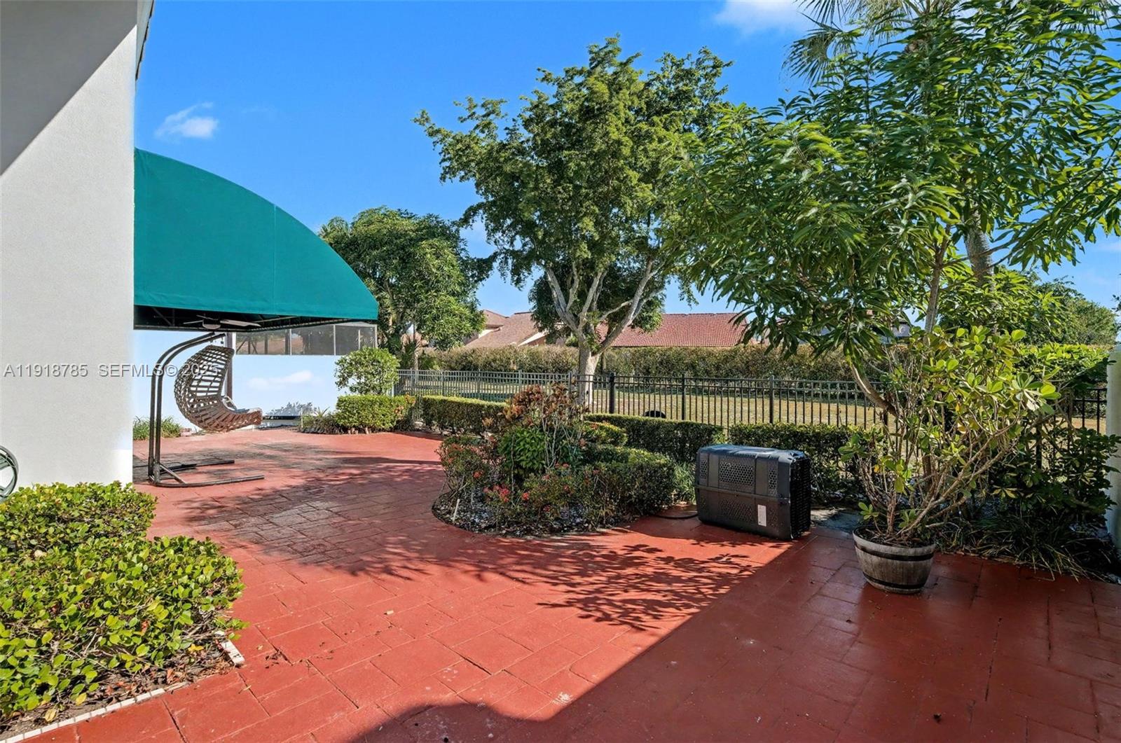 6438 Via Rosa Boca Raton, FL 33433 - Photo 8 of 45 a outdoor view with patio