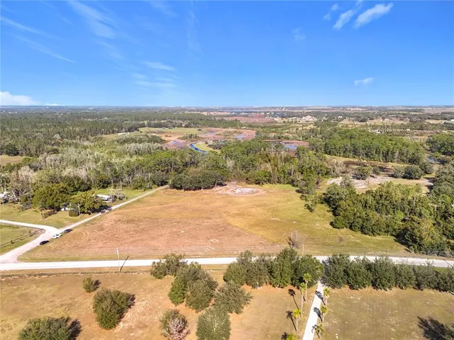 a view of a yard with an ocean