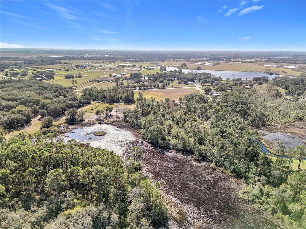Pine Island Road Clermont, FL 34711 - Photo 9 of 18 an aerial view of multiple house