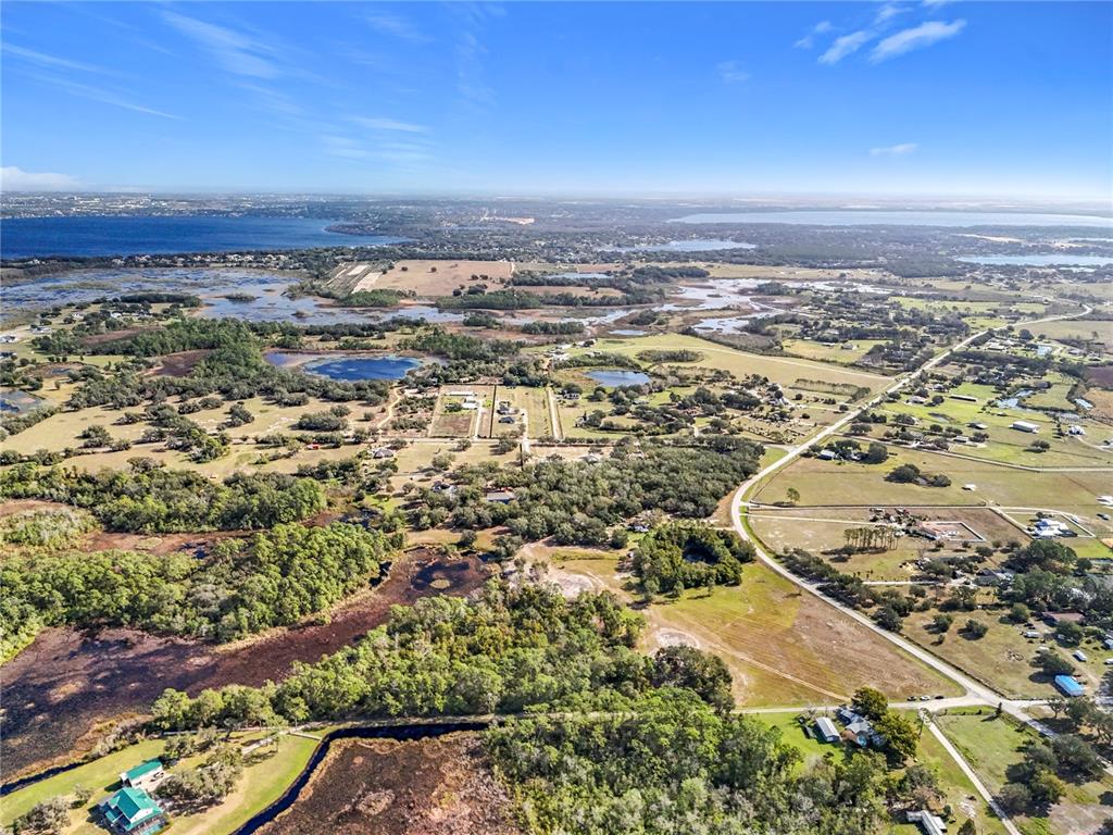 Pine Island Road Clermont, FL 34711 - Photo 10 of 18 an aerial view of ocean and residential houses with outdoor space