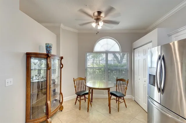 a view of a livingroom with furniture and a window