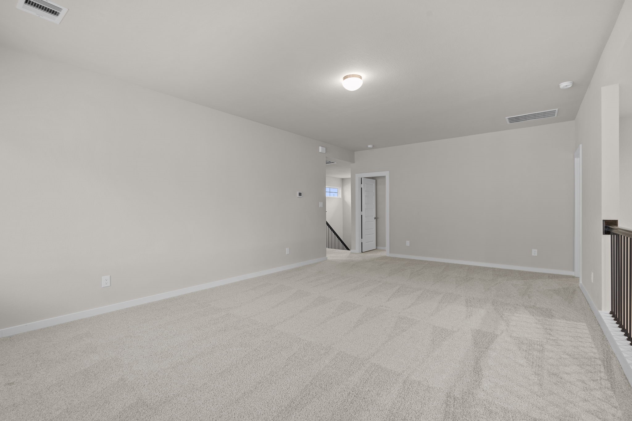 3034 Spitfire Drive Rosenberg, TX 77471 - Photo 29 of 47 a view of an empty room and a window