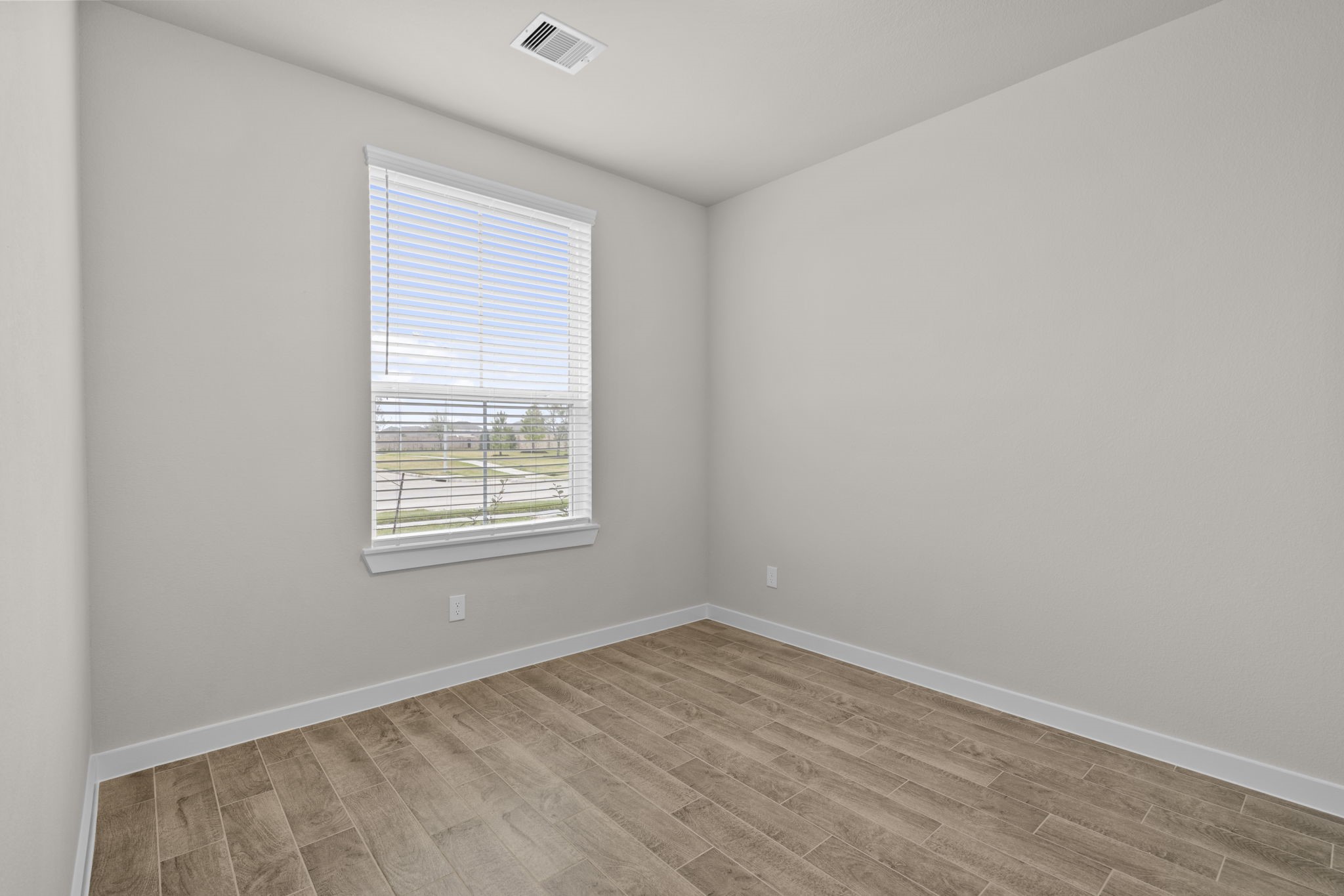 3034 Spitfire Drive Rosenberg, TX 77471 - Photo 7 of 47 an empty room with a window