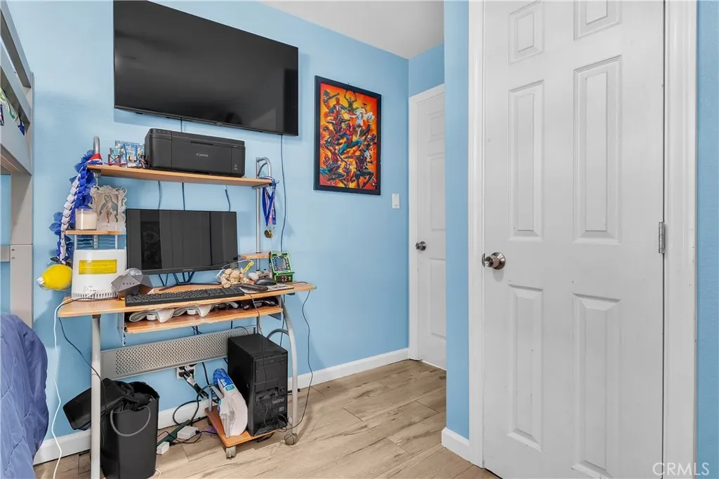 3738 Ahern Drive Baldwin Park, CA 91706 - Photo 11 of 36 a view of a livingroom with furniture and a flat screen tv