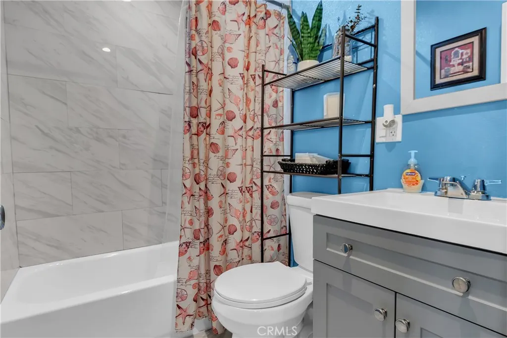 3738 Ahern Drive Baldwin Park, CA 91706 - Photo 14 of 36 a bathroom with a sink a toilet and shower