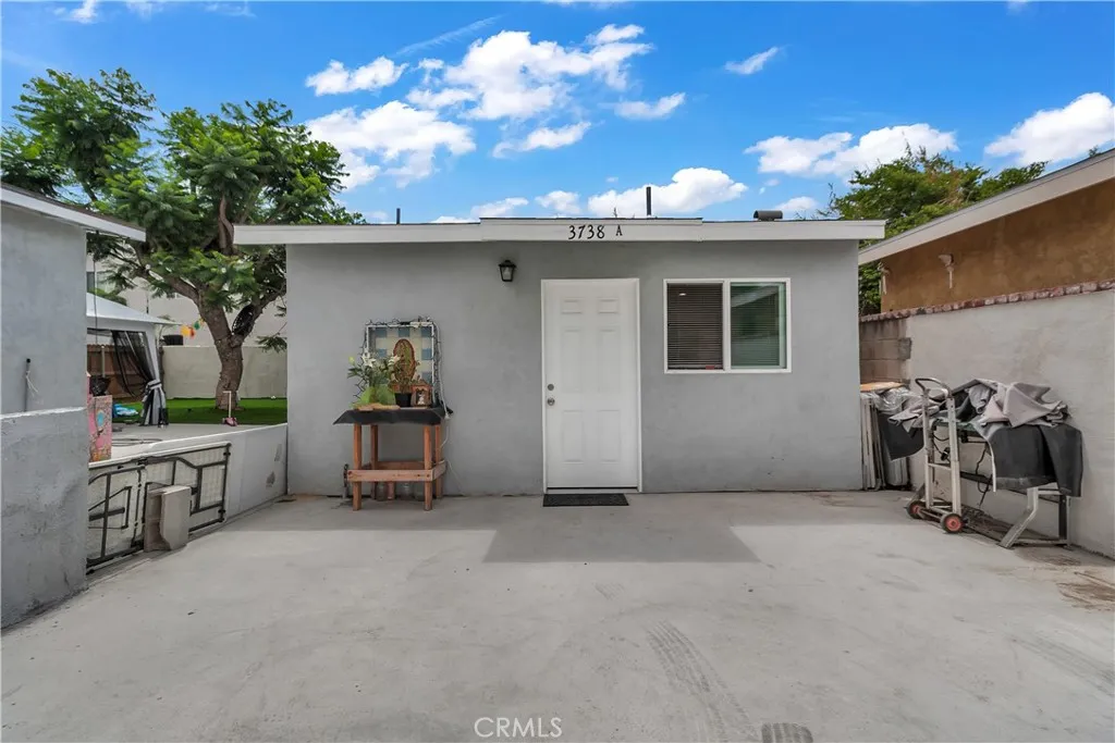 3738 Ahern Drive Baldwin Park, CA 91706 - Photo 21 of 36 a view of a house with patio furniture and a yard