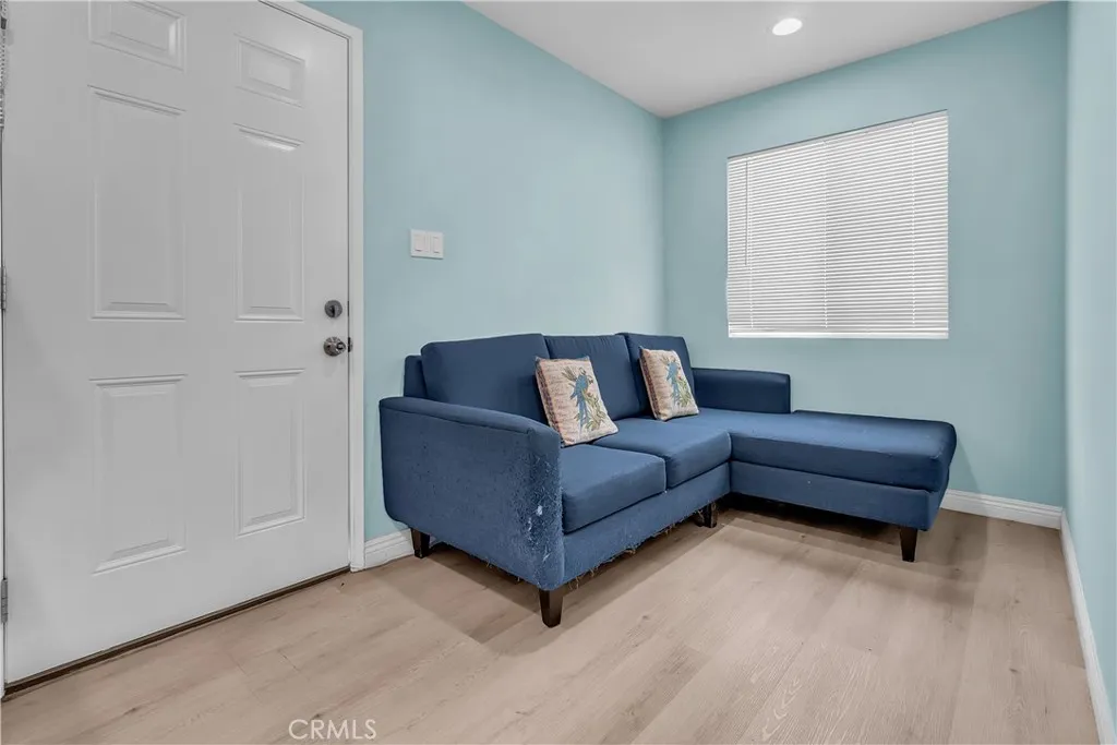 3738 Ahern Drive Baldwin Park, CA 91706 - Photo 23 of 36 a living room with furniture and a window