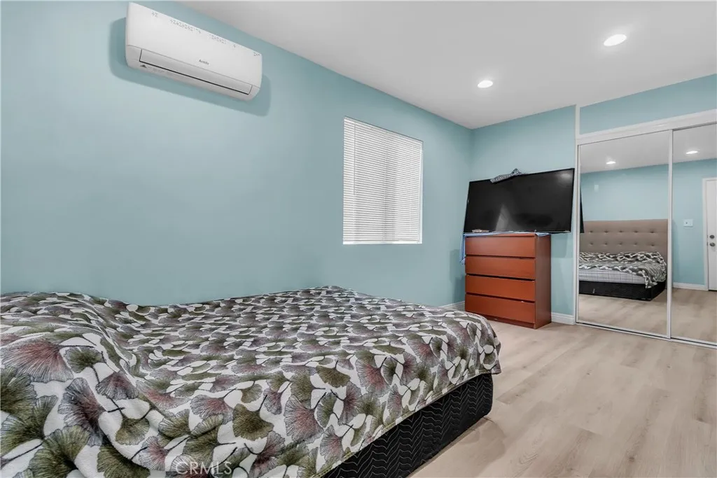 3738 Ahern Drive Baldwin Park, CA 91706 - Photo 28 of 36 a bedroom with a bed and a television