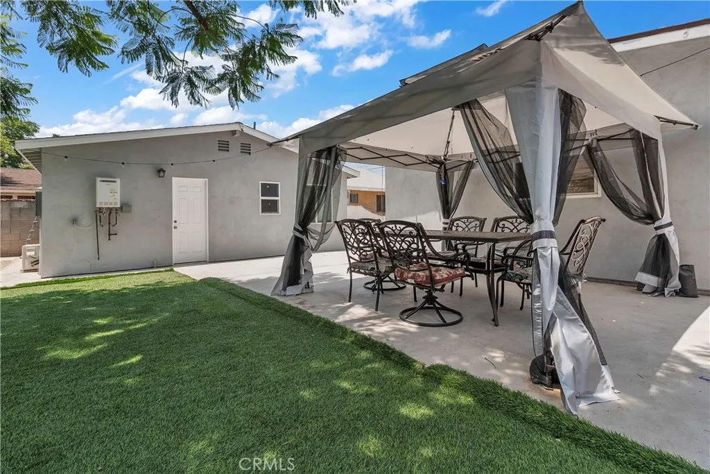 3738 Ahern Drive Baldwin Park, CA 91706 - Photo 30 of 36 a view of an outdoor sitting area with chairs