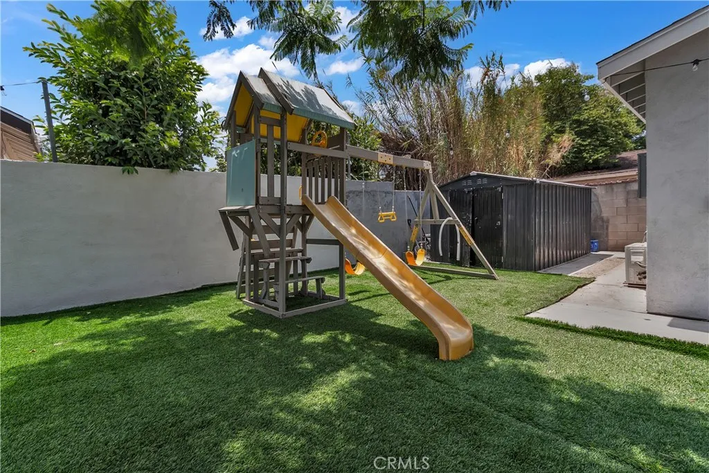 3738 Ahern Drive Baldwin Park, CA 91706 - Photo 31 of 36 a view of a house with backyard and a slide