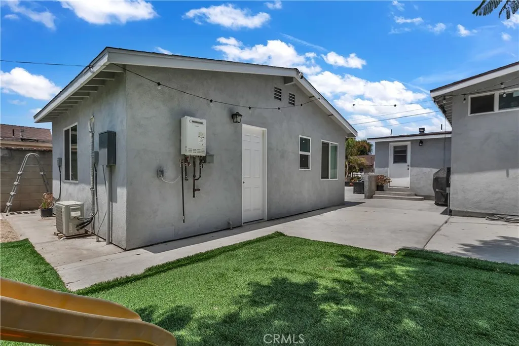 3738 Ahern Drive Baldwin Park, CA 91706 - Photo 33 of 36 a front view of a house with garden