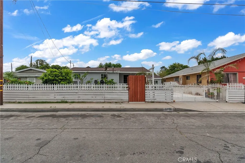 3738 Ahern Drive Baldwin Park, CA 91706 - Photo 35 of 36 a front view of a house with a big yard