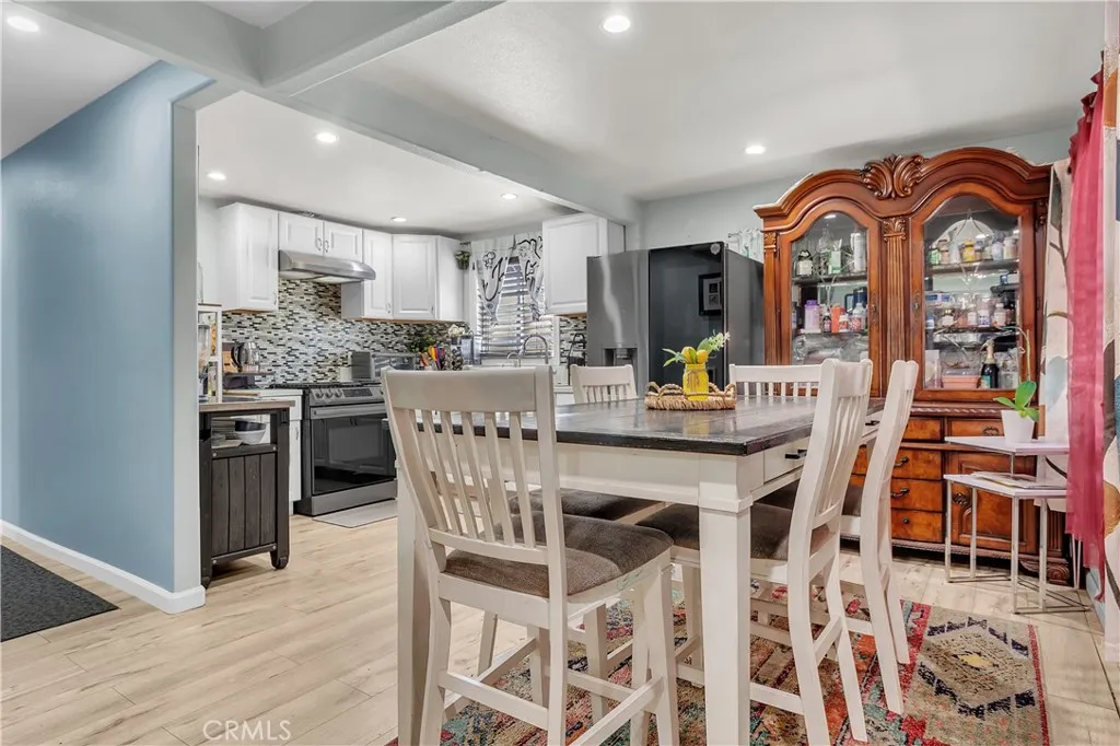 3738 Ahern Drive Baldwin Park, CA 91706 - Photo 7 of 36 a view of a dining room with furniture