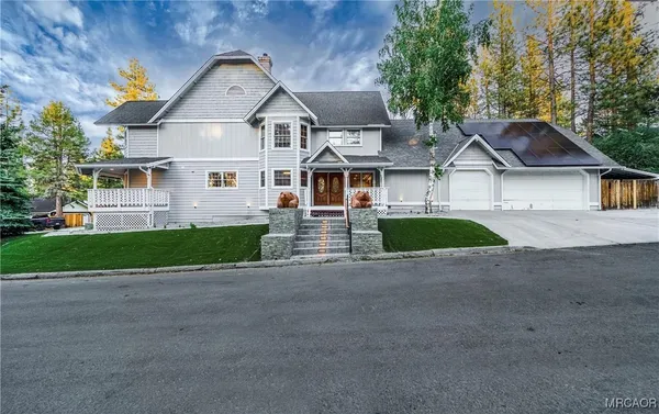 front view of a house with a small yard