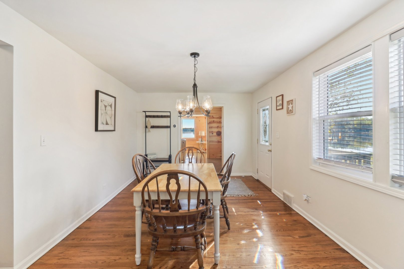 35193 North Wilson Road Ingleside, IL 60041 - Photo 11 of 45 a view of a dining room with furniture window and wooden floor