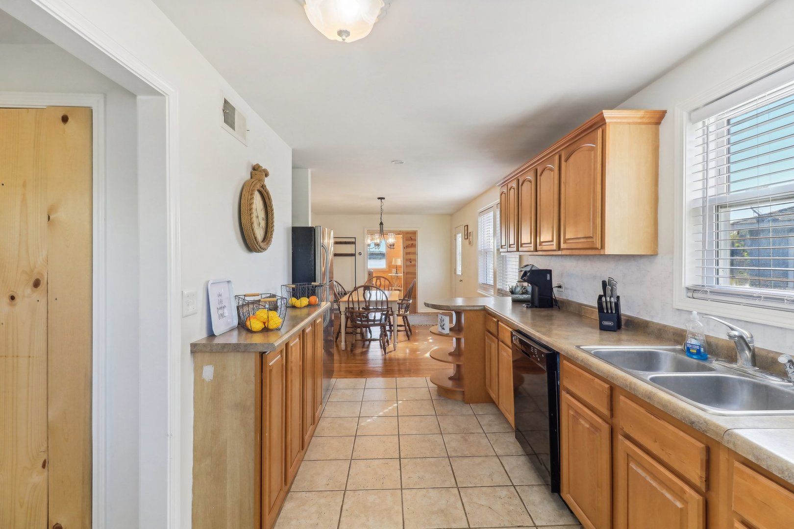 35193 North Wilson Road Ingleside, IL 60041 - Photo 15 of 45 a kitchen with stainless steel appliances granite countertop a sink and a refrigerator
