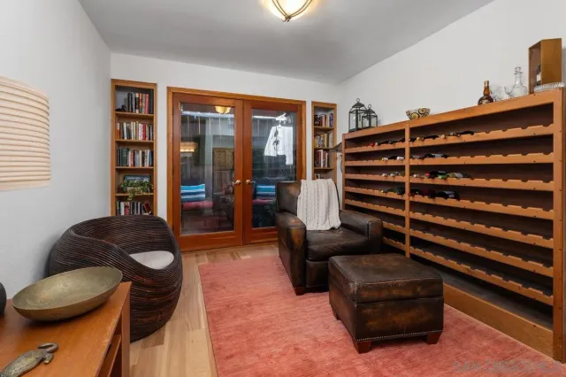 a bathroom with a sink vanity mirror and toilet