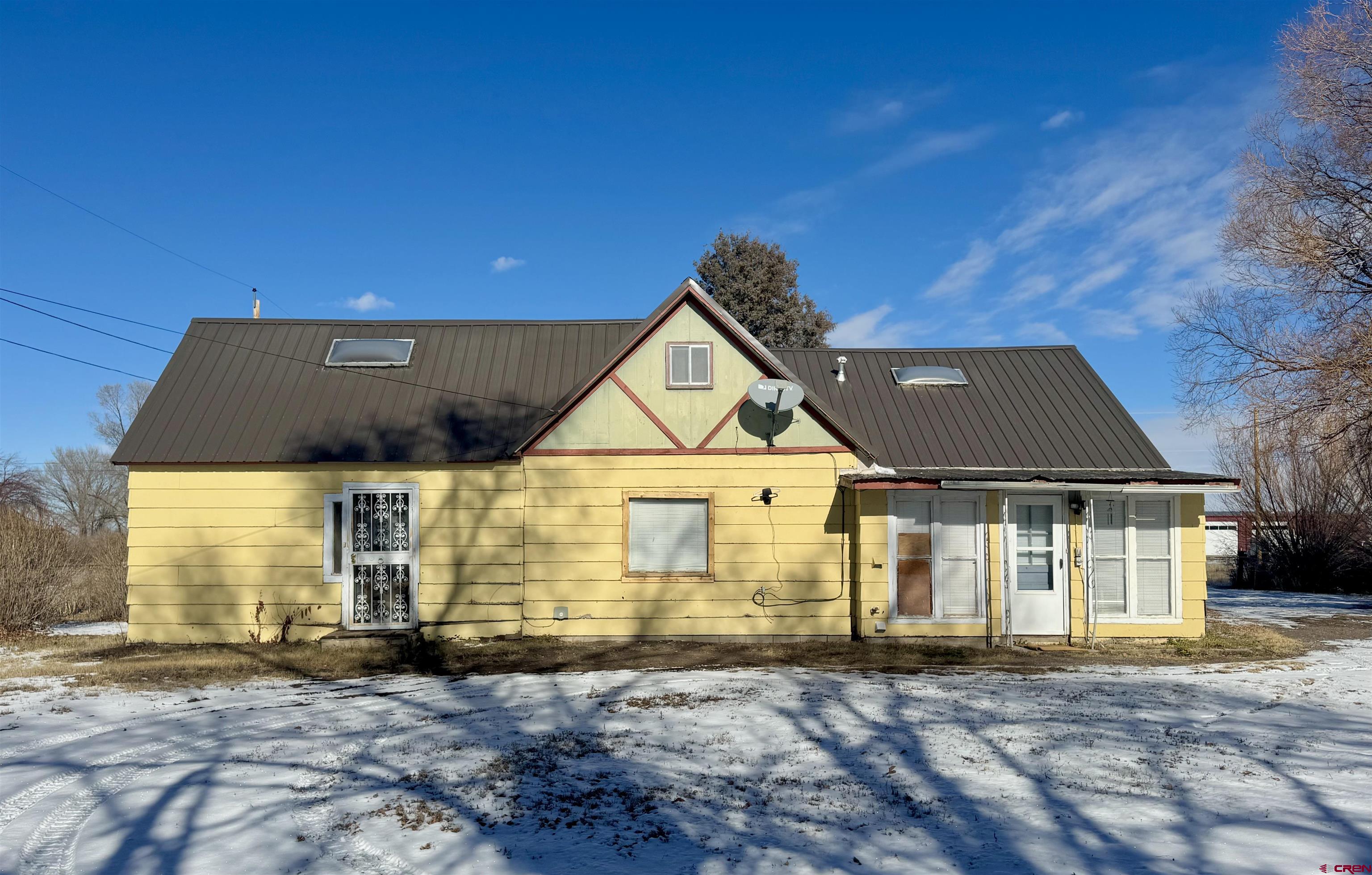 a house view with a garden space