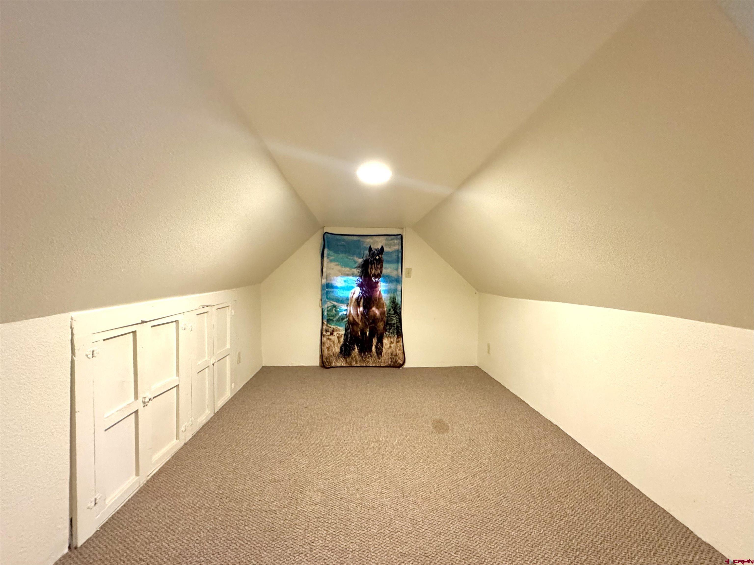 420 North 5th Street Manassa, CO 81141 - Photo 19 of 21 a view of an empty room with wooden floor