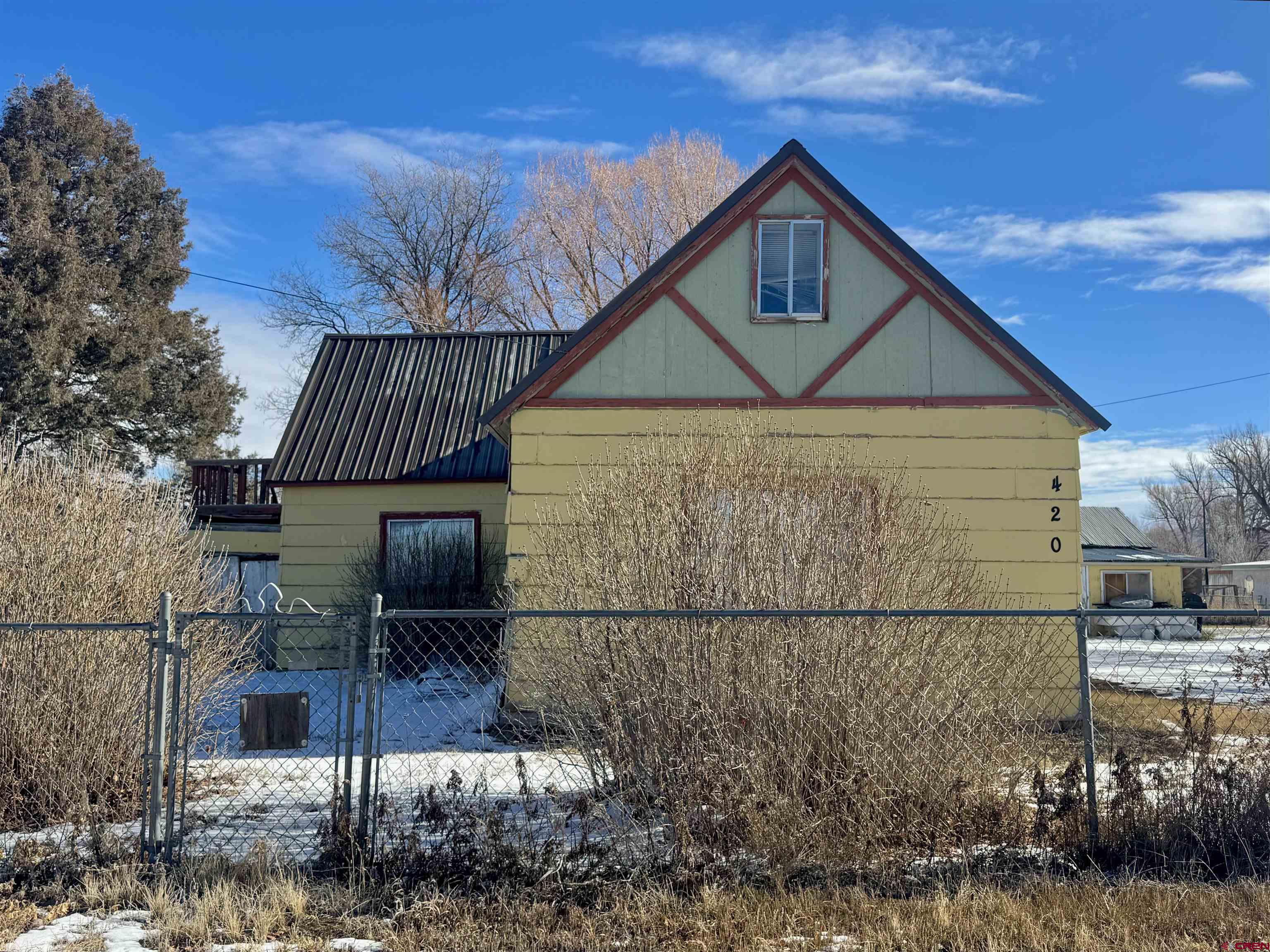 420 North 5th Street Manassa, CO 81141 - Photo 10 of 21 a front view of a house with garden