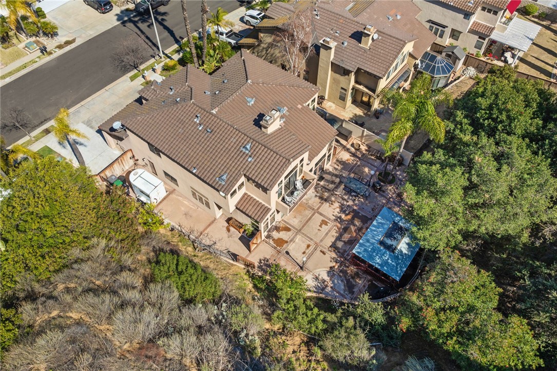 3270 Star Canyon Circle Corona, CA 92882 - Photo 29 of 55 an aerial view of a house with a yard
